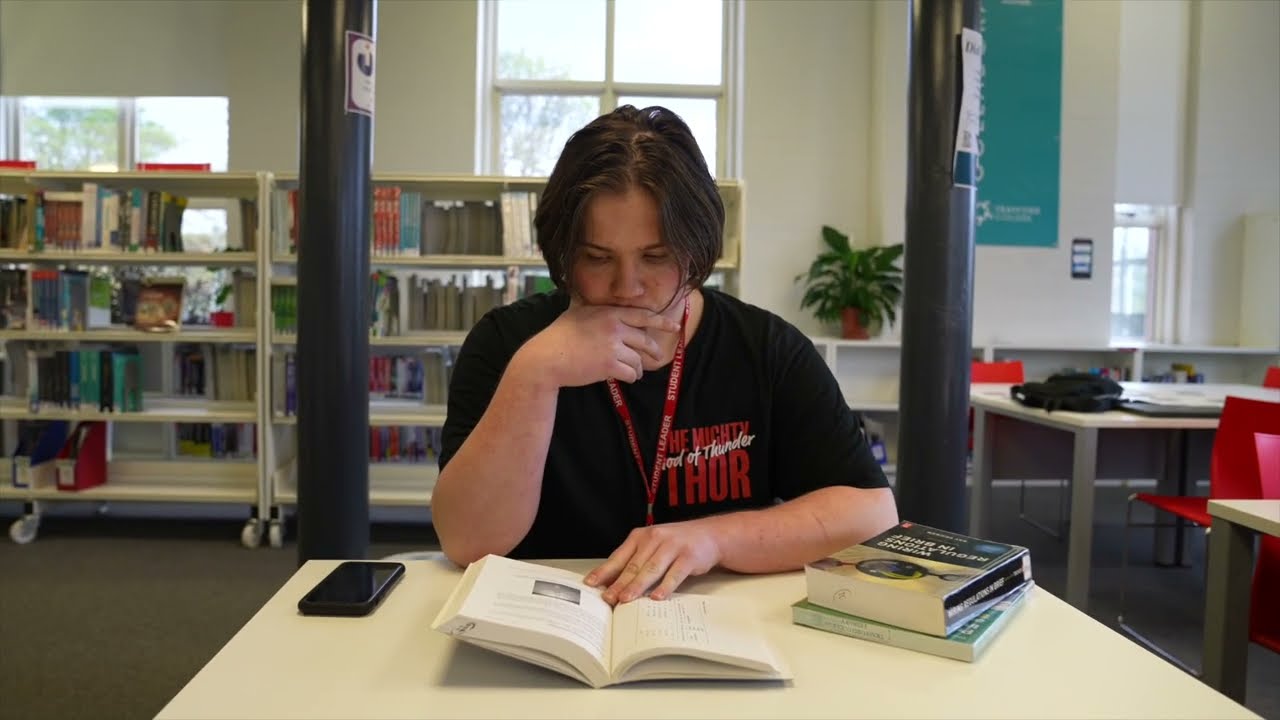 stretford campus student in the library